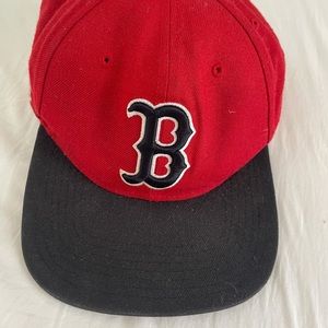 Red Sox baseball cap.